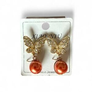 Gold butterfly earrings with copper
